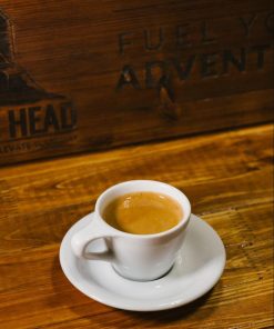 Espresso in white cup and saucer